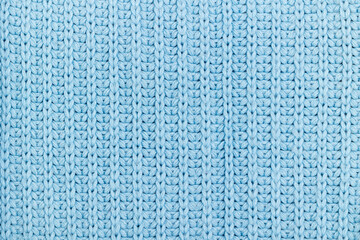 Blue knitted texture with loops