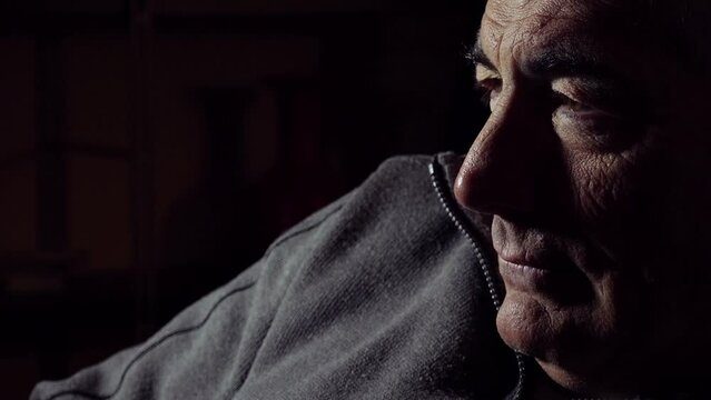 depressed lonely mid aged man in the night: sleepless pensive man