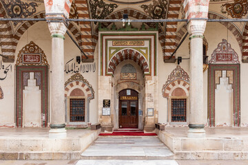 Manisa Sultan Mosque is directly opposite the main entrance gate