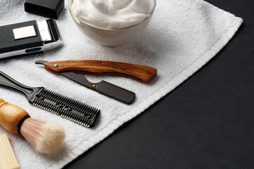 Traditional Wet Shaving Gear Arranged on a Dark Background With Morning Light