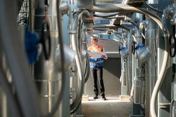 Engineers inspect the completed air conditioning and water systems to continue verifying their...