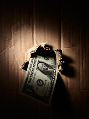 one dollar bills through the paper hole money background - 774041091
