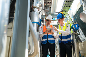 Engineers and technicians Inspect the completed air conditioning and water systems to continue...