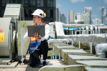 Engineers inspect the completed air conditioning and water systems to continue verifying their...