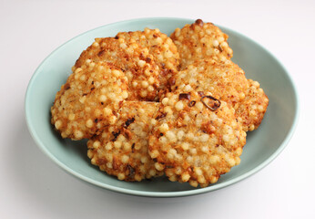 A plate of sabudana vadas, an Indian fried snack made from sago or sabudana