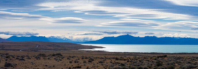 Expansive Patagonian Landscape with Lenticular Clouds and Lake