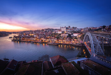 Illuminated Porto Skyline with Douro River and Dom Luis I Bridge at sunset - Porto, Portugal
