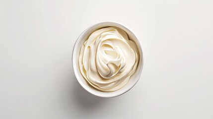 View from the top of a bowl of cream on a white background