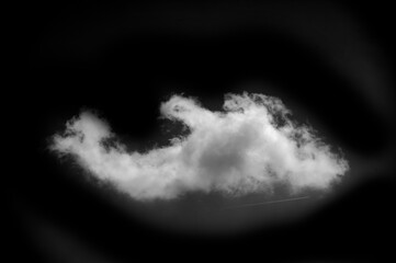 White cloud on a black background. Bold contrast of white cloud on black background for design...