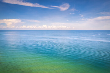 Fototapeta na wymiar Serene green and blue waters of the ocean. Naples Beach, Florida
