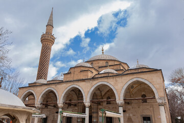 Fototapeta na wymiar View from the outside of Afyonkarahisar Imaret Mosque. Dark clouds on a cloudy day