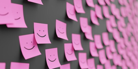 Many pink stickers on black board background with happy smile symbol drawn on them. Closeup view...