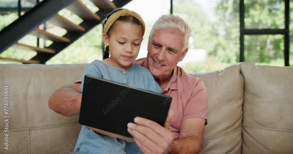 Canvas Prints Girl, man or tablet as fun, learning or technology as mobile, gaming or app on sofa in home. Grandpa, child or touch screen to play, browse or read as elearning, streaming or bonding together