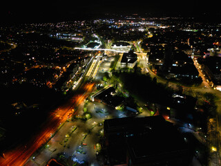 Fototapeta na wymiar Aerial Night Footage of Illuminated Aylesbury Town of England UK