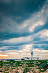 Fototapeta na wymiar Cavalleria Lighthouse in Menorca, Spain.