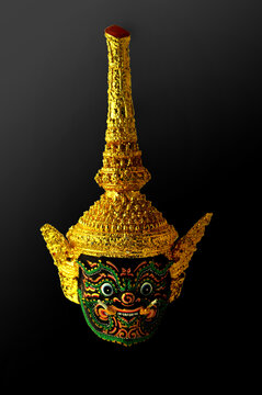 Actor's mask in Thai classical masked play(or masked ballet) performed by traditional Thai style dancers waring the costume and mask in the story of Ramayana.