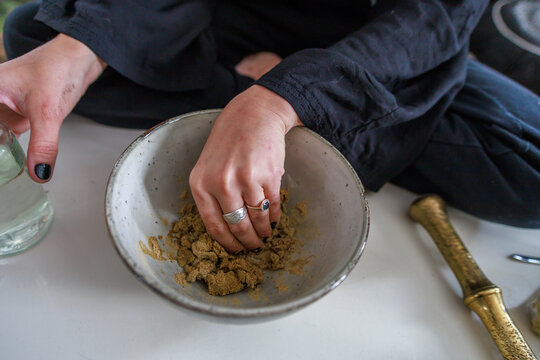 Manual process of making incense cones.