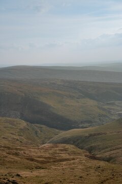 Vertical shot of the hills in Bleaklow, a high gritstone moorland in the Derbyshire High Peak