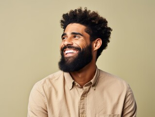 Fototapeta premium A man with a bright color clothing is smiling and laughing