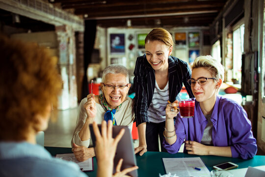 Diverse team of women in a meeting at startup office space