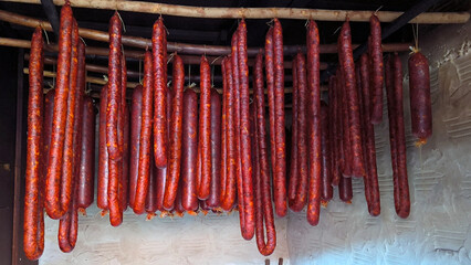 traditional way of drying homemade pork sausages