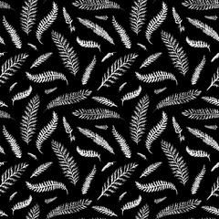 Seamless floral pattern with colorful leaves isolated on the black background. Flat template.
