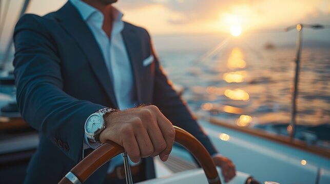 Hand of man on steering wheel sailboat. Hands on the sailboat's steering wheel Yacht. Close-up of a mans hands on yacht steering wheel. Helm yacht