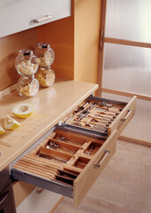 Detail of equipped kitchen drawers