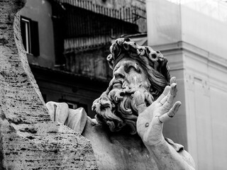 Black and white view of a statue in Rome in Italy