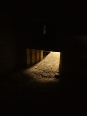 Sunlight through bunker door in Normandy in France - obrazy, fototapety, plakaty