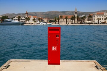 Fire extinguisher at Trogir Harbor in Croatia - 774091818