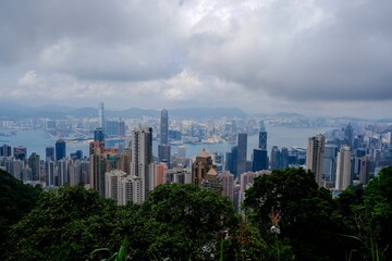 Cityscape of Hong Kong under a cloudy sky on a gloomy day