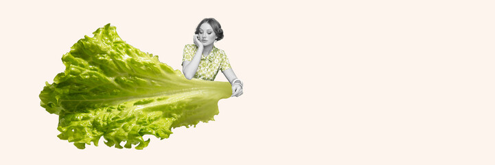 Monochrome image of beautiful young woman near giant lettuce piece isolated on white background....