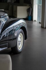 Front wheel of a black vintage car