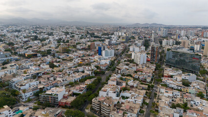 Aerial Drone view of Lima the capital city of Peru skyline, Mireflores Barranco morning traffic south america