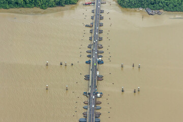 The world's longest movable vehicular pontoon bridge over the Demerara River in Georgetown, Guyana,...