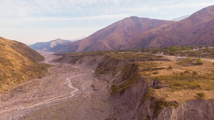 Fototapeta na wymiar Mountains with a small water stream in Jujuy, Argentina