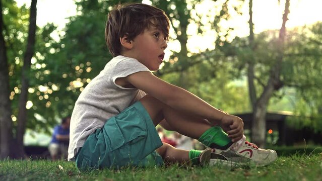 Final Adjustments To Sneakers Show Little Boy&rsquo;s Demand For Foot Comfort