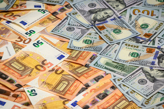 Dollar and euro Closeup Concept. Dollar and euro Cash Money. Banknotes. Cash of Dollar and euro bills, money background.7