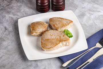 Roasted red tuna steak in the plate