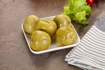 Homemade pickled green tomato appetizer