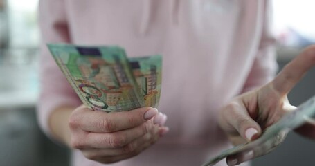 Women hands counting belarusian money 4k movie slow motion. Economic crisis in Belarus concept