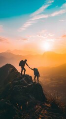 Amidst the golden hour glow, two hikers extend hands in assistance, epitomizing teamwork on a rugged mountain summit.
