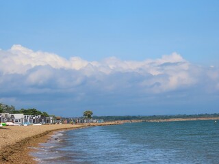 beach huts on the beach at Calshot Hampshire England