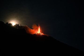 Fototapeta na wymiar Eruption of the Stromboli in the Eolian Islands next to Sicily.