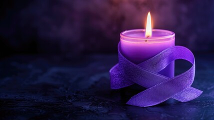 A lit purple candle wrapped with a matching ribbon against moody, dark background