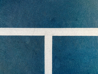 Racquet or Paddle Sports Court Surface Close-Up. Vibrant colored sport or tennis court surface....