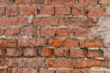 An old crumbling brick wall. textured background