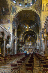 Golden wall with beautiful mosaic inside San Marco Basilica, Venice, Veneto, Italy