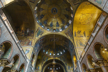 Golden wall with beautiful mosaic inside San Marco Basilica, Venice, Veneto, Italy